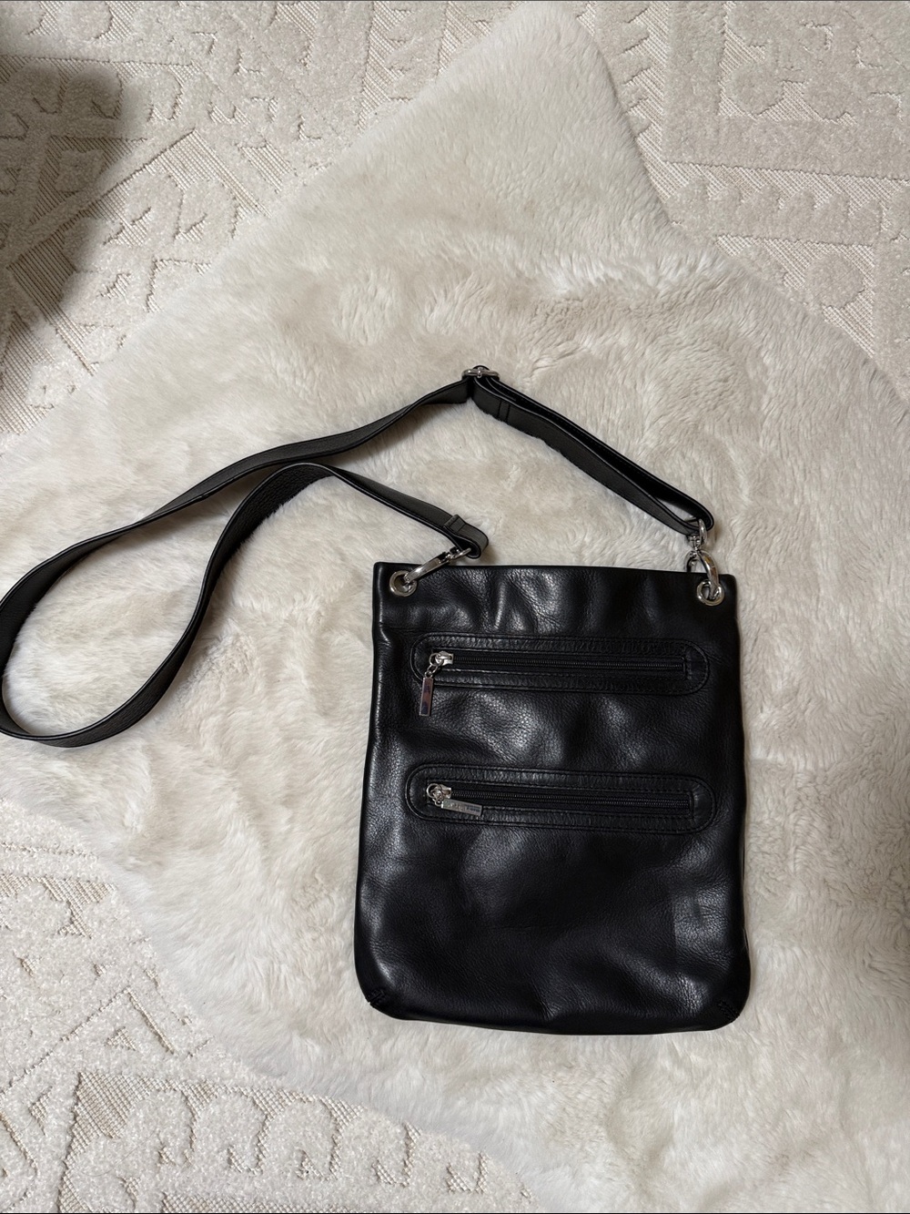 Sleek Black Leather Crossbody Bag with Dual Zip Pockets
